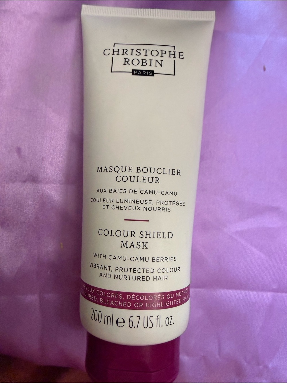 White Hair Care Tube with Black Text
